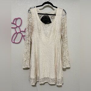 Hot topic dress cream colored with black skull on back